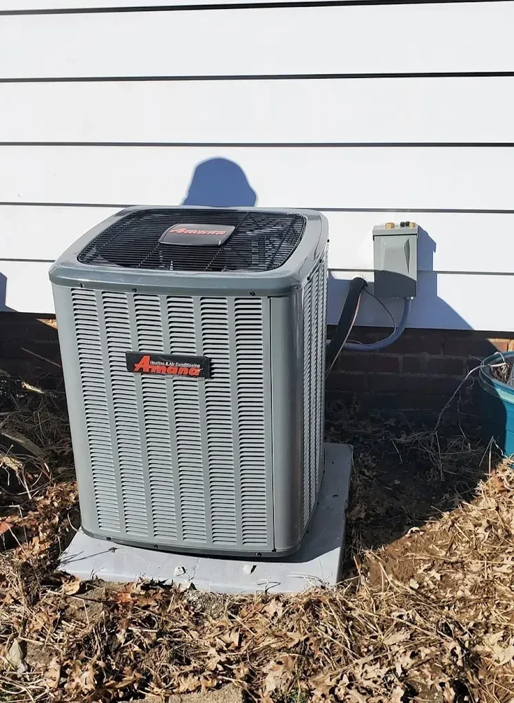 Comprehensive AC Repair Guide for Homeowners 2 Homeowner diagnosing air conditioning unit outdoors with tools, emphasizing effective troubleshooting techniques